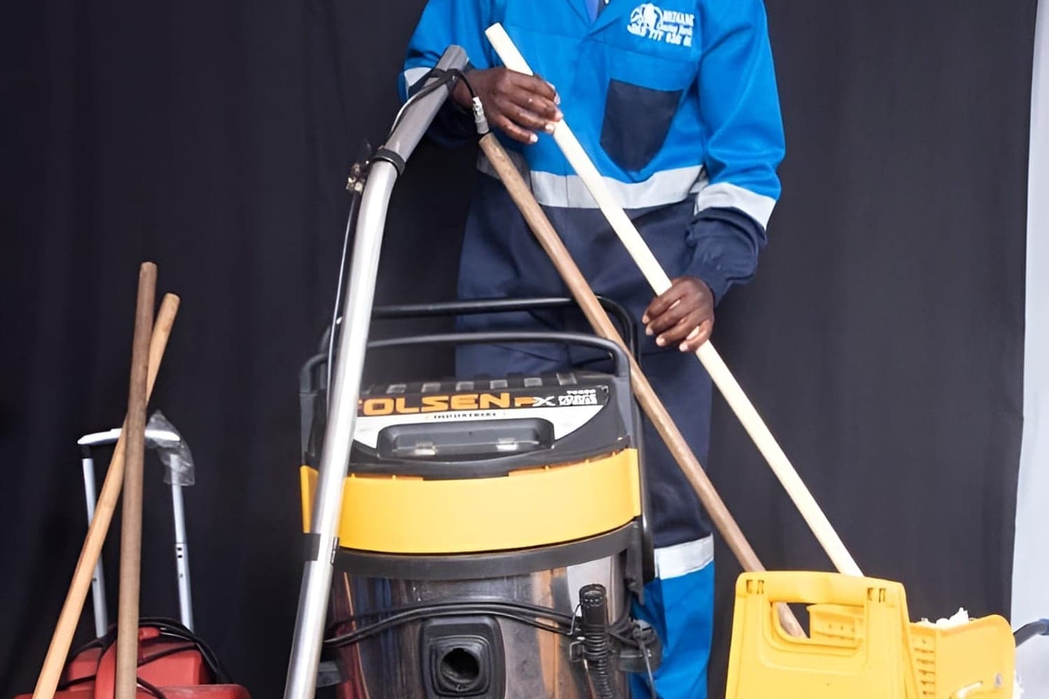 A Brinancy technician with the wet and dry extraction vacuum used on carpets and upholstery